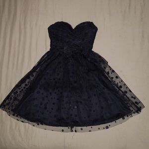 Black polka dotted strapless dress